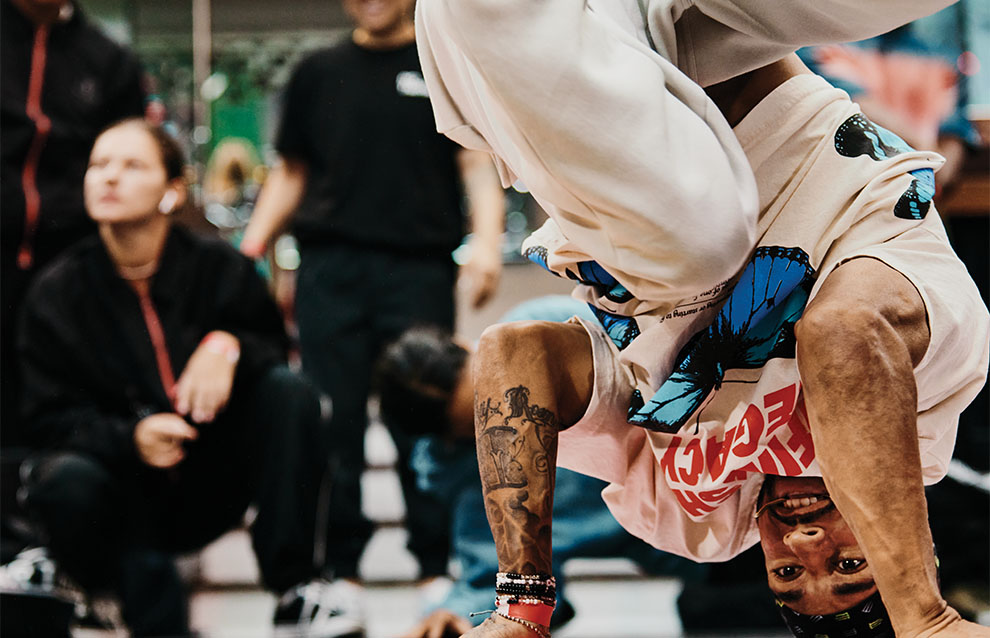a person doing a handstand on the floor