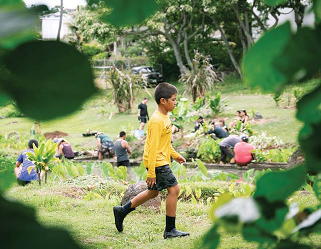 a child walking in a field
